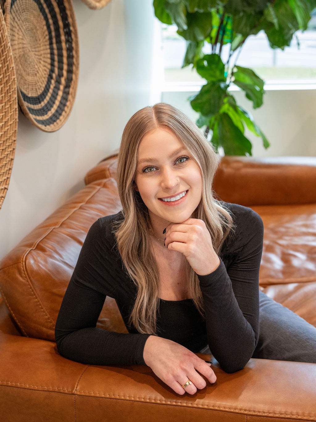 Claire photographed in natural light for a professional headshot