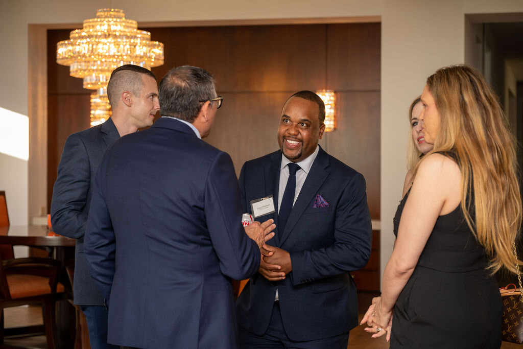 Guests connecting at a professional dinner
